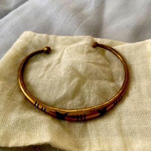 Brass bangle or cuff with design made in Africa.
